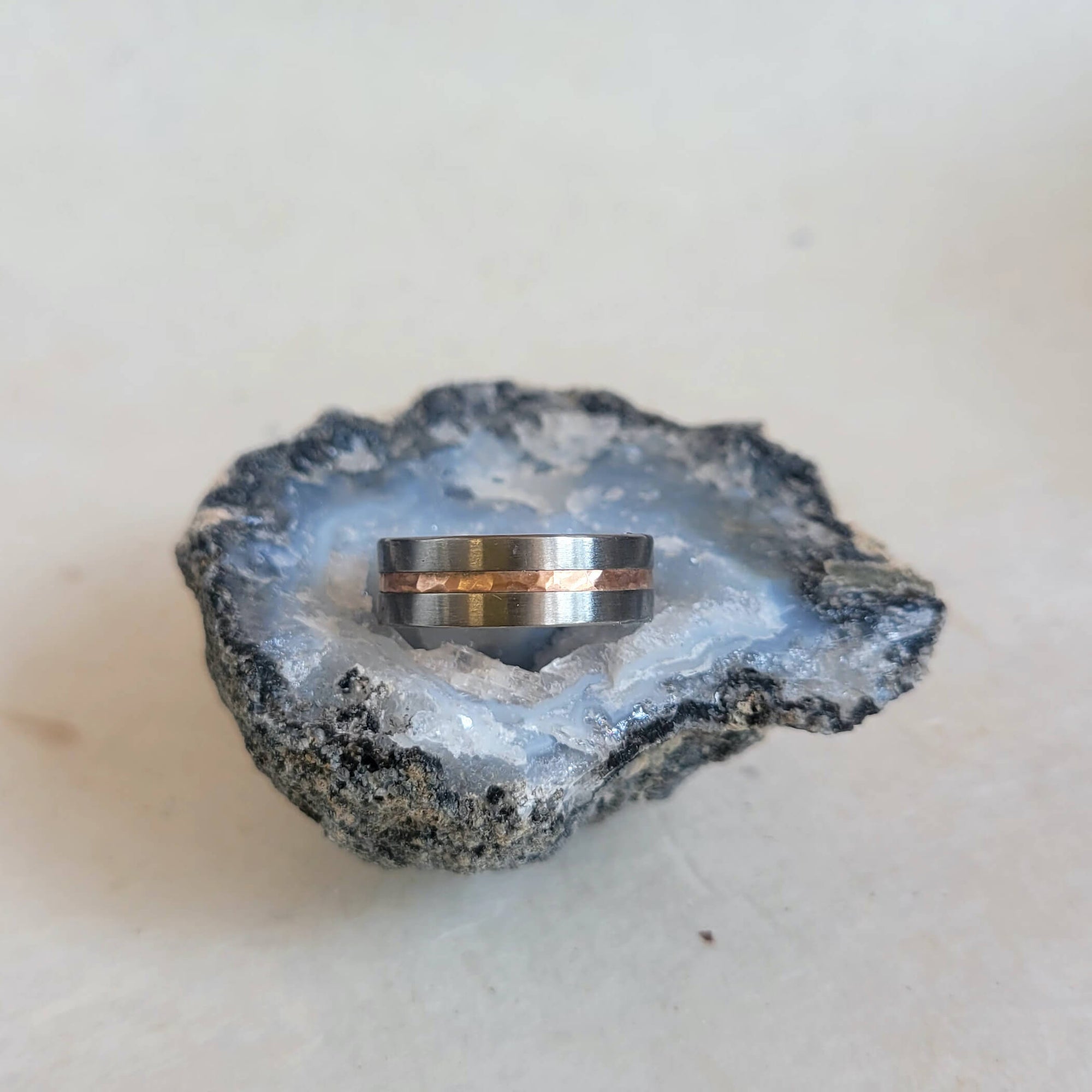 Handmade palladium and red gold mixed metal wedding band. Made by EC Design Studio in Minneapolis, MN using recycled metal.