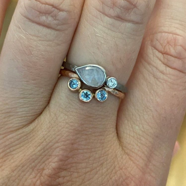 Icy gray diamond and sapphire ring. Handmade by EC Design Jewelry in Minneapolis, MN. This ring was made with recycled metal and conflict-free stones.