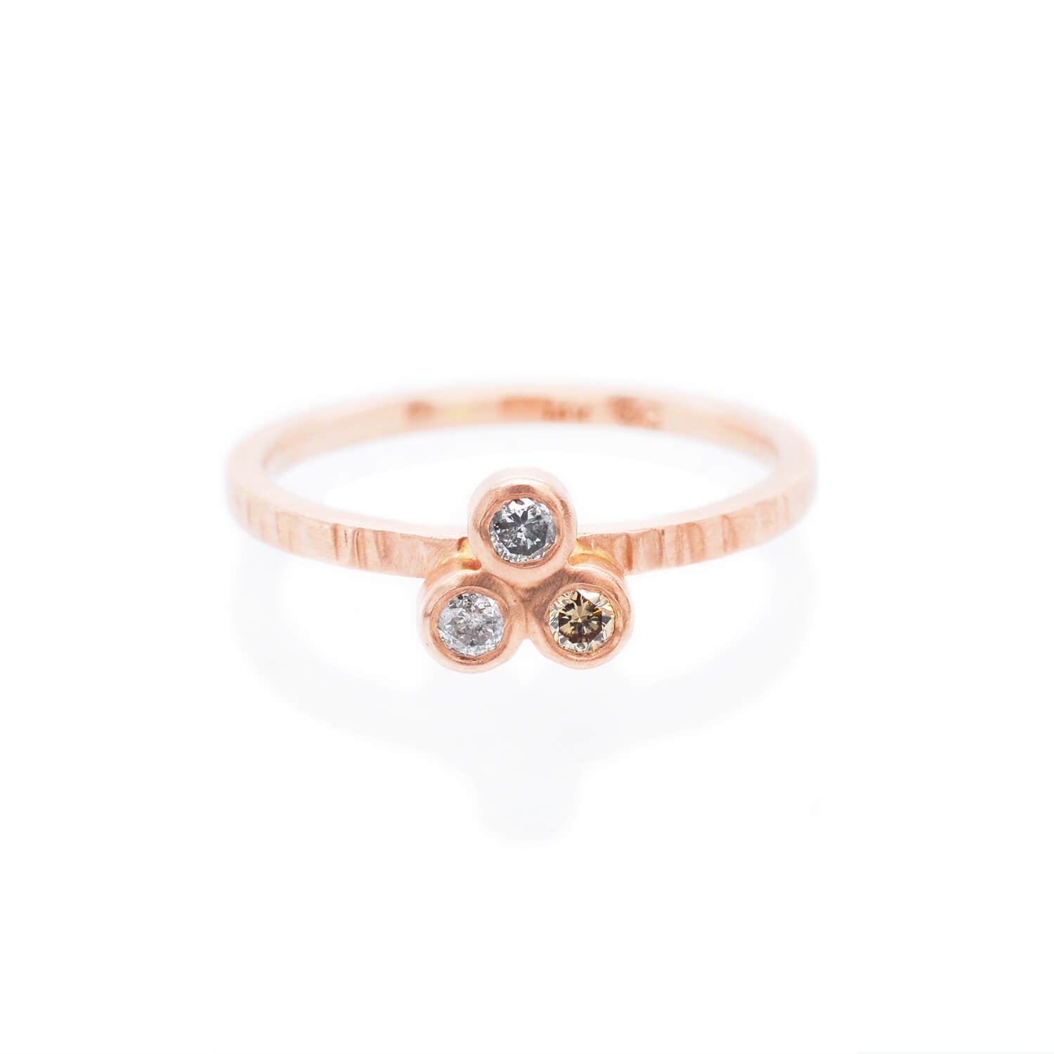 3-stone red gold ring with salt and pepper and champagne diamonds. Ethically crafted by EC Design Jewelry in Minneapolis, MN.