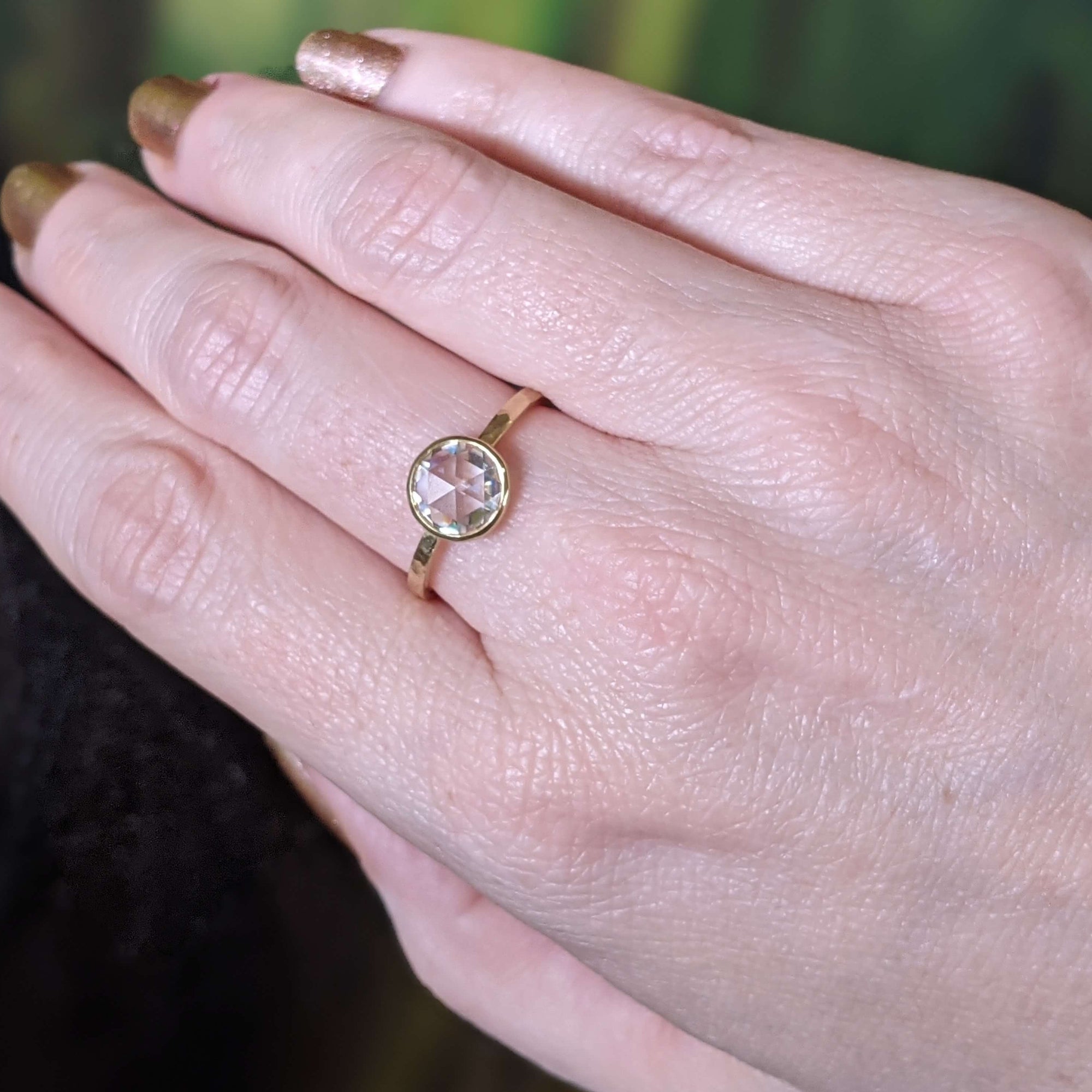 Rose cut Moissanite engagement ring in hammered yellow gold. A beautiful ring handmade by EC Design in Minneapolis, MN using recycled metal and conflict-free stone.