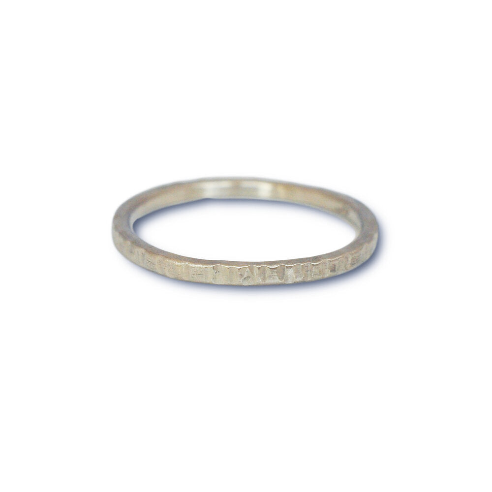 Hammered wedding band in 500 palladium. Handmade with recycled metal  by EC Design Studio in Minneapolis, MN.
