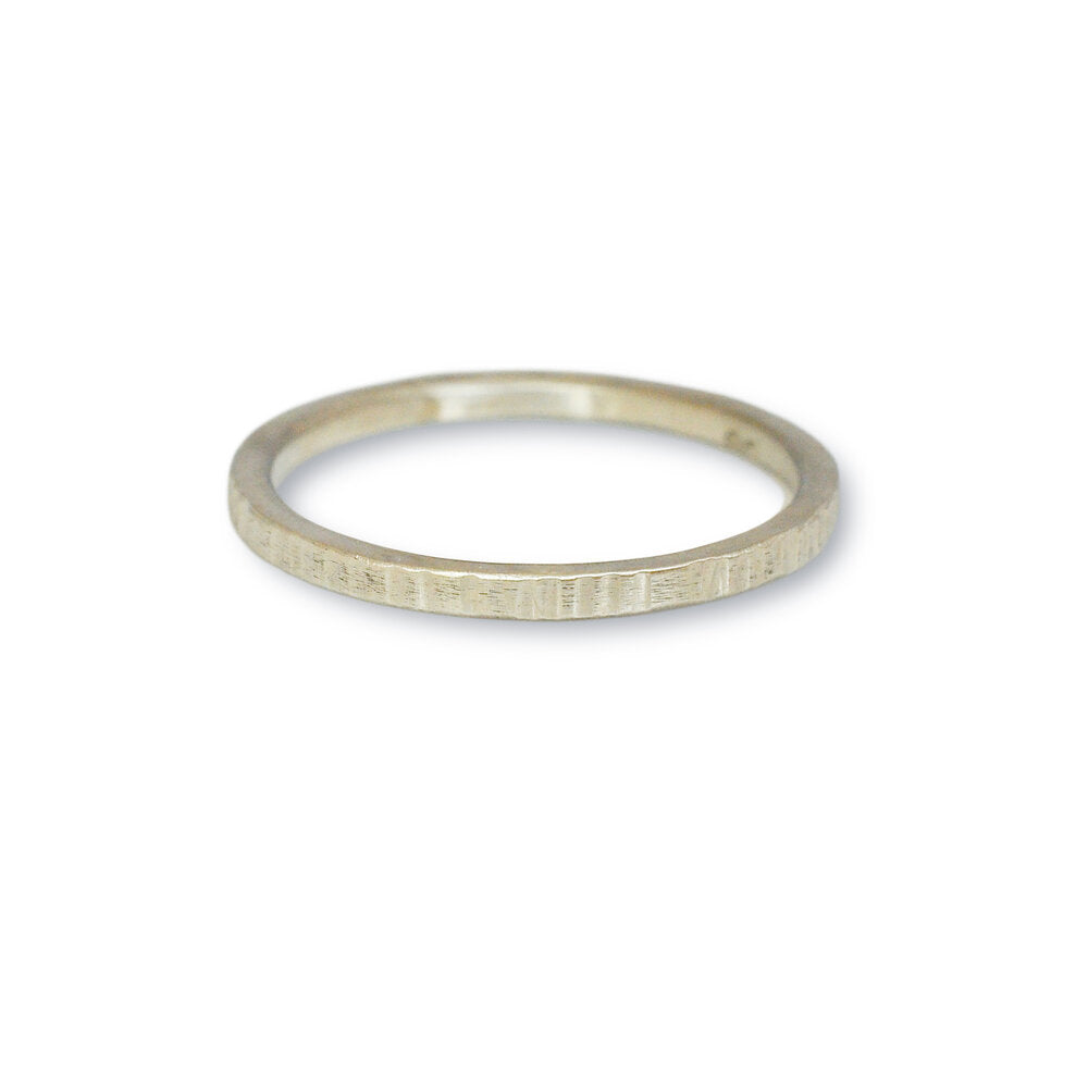 Linear hammered wedding band in 950 platinum. Handmade with recycled metal  by EC Design Studio in Minneapolis, MN. 