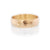14k yellow gold facet hammered wide wedding band. Handmade by EC Design Jewelry in Minneapolis, MN using recycled metal.