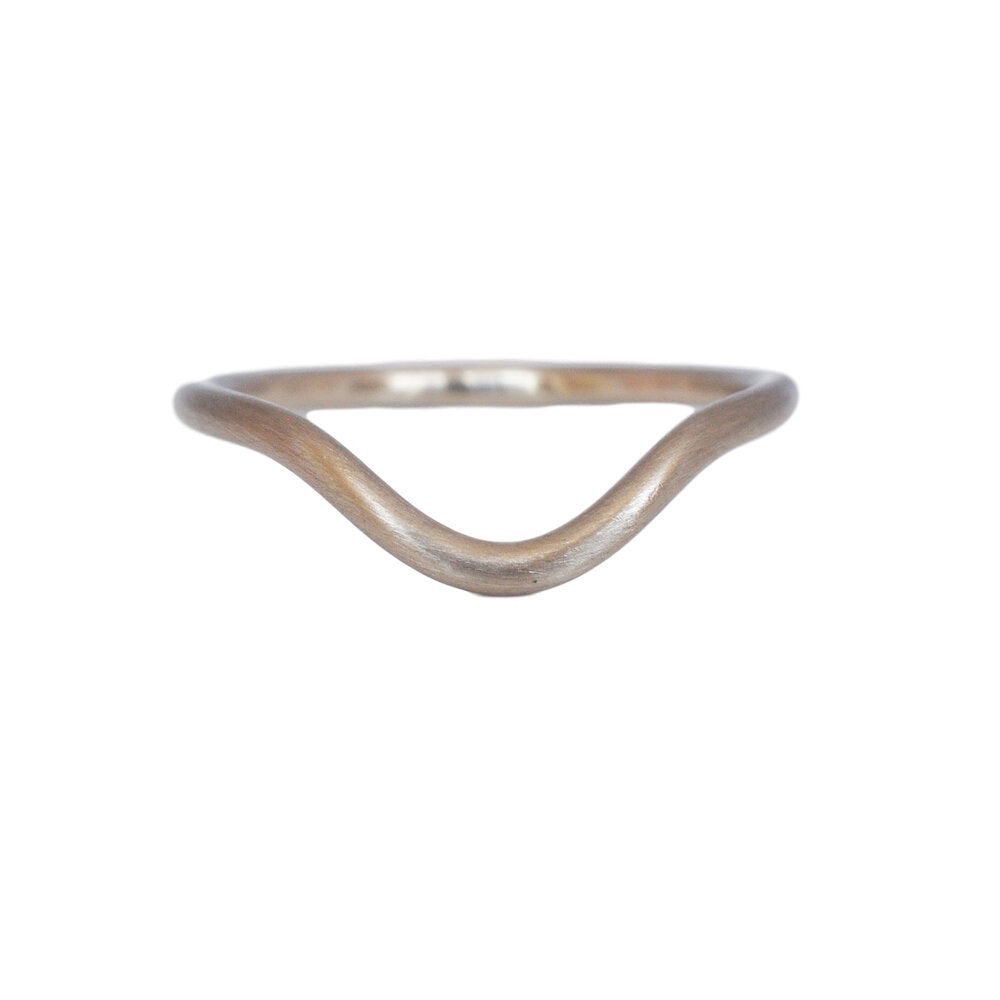 Curved palladium white gold wedding band in a satin finish. Handmade in Minneapolis, MN by EC Design Studio using recycled metal.