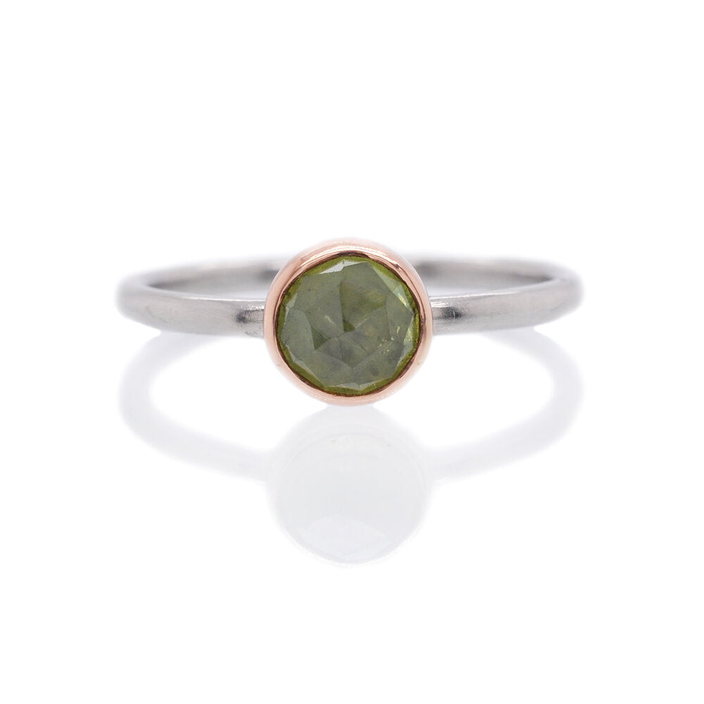 Green rose cut sapphire in red gold on a palladium band. Handmade by EC Design Jewelry in Minneapolis, MN using recycled metal and conflict-free stone.