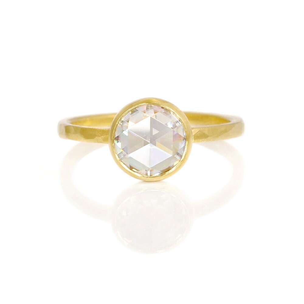 Rose cut Moissanite engagement ring in hammered yellow gold. A beautiful ring handmade by EC Design in Minneapolis, MN using recycled metal and conflict-free stone.