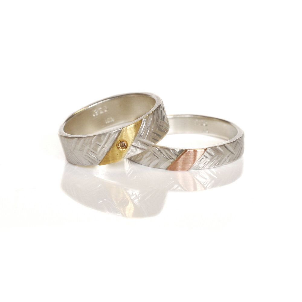 Wide hammered sterling silver band with yellow gold and champagne diamond accent. Handmade by EC Design Jewelry in Minneapolis, MN using recycled metal and conflict-free stone.