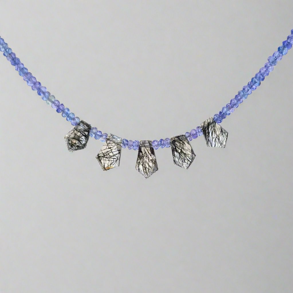 Tanzanite Faceted Bead Strand with Tourmalated Quartz Daggers