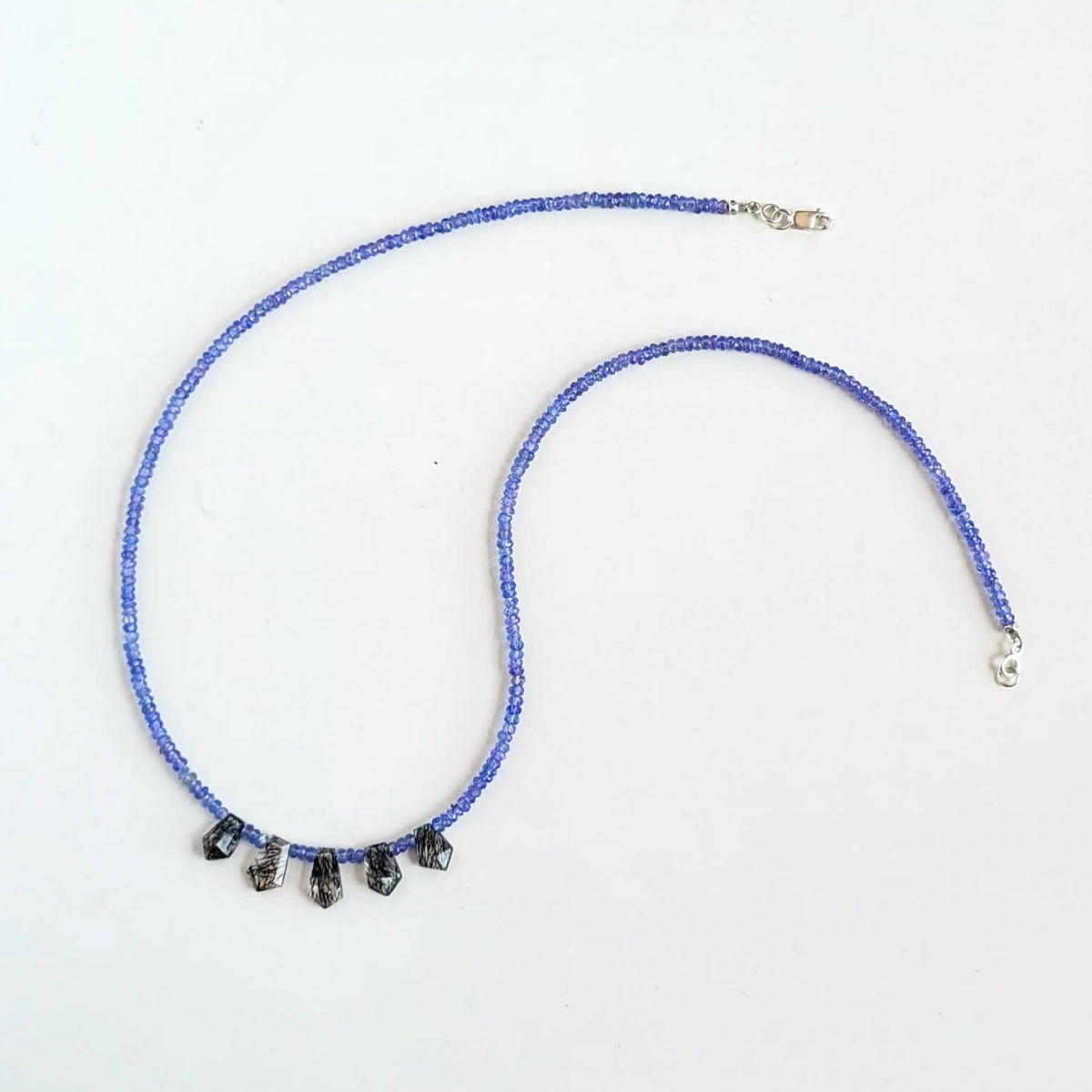Tanzanite Faceted Bead Strand with Tourmalated Quartz Daggers