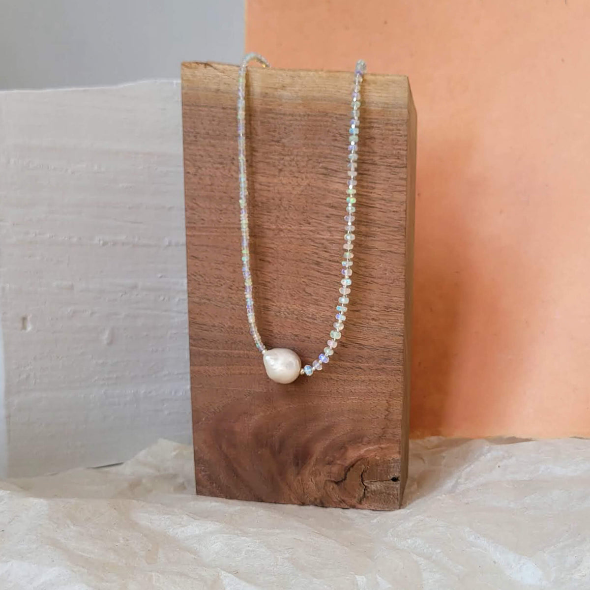 Iridescent Opal and Silver Necklace with a Baroque Pearl Center