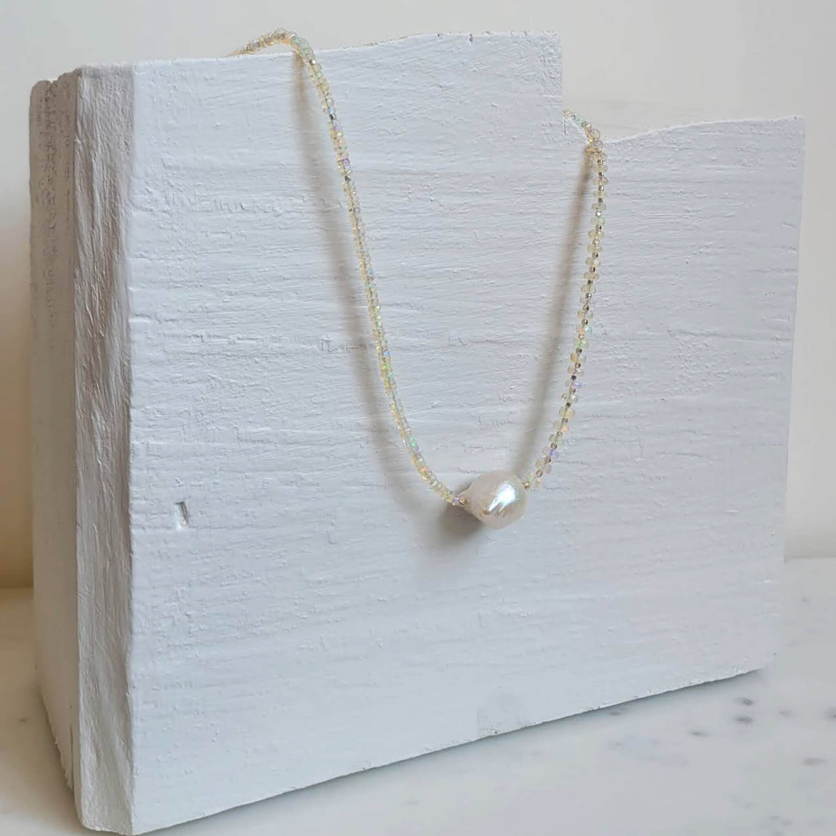 Iridescent Opal and Silver Necklace with a Baroque Pearl Center