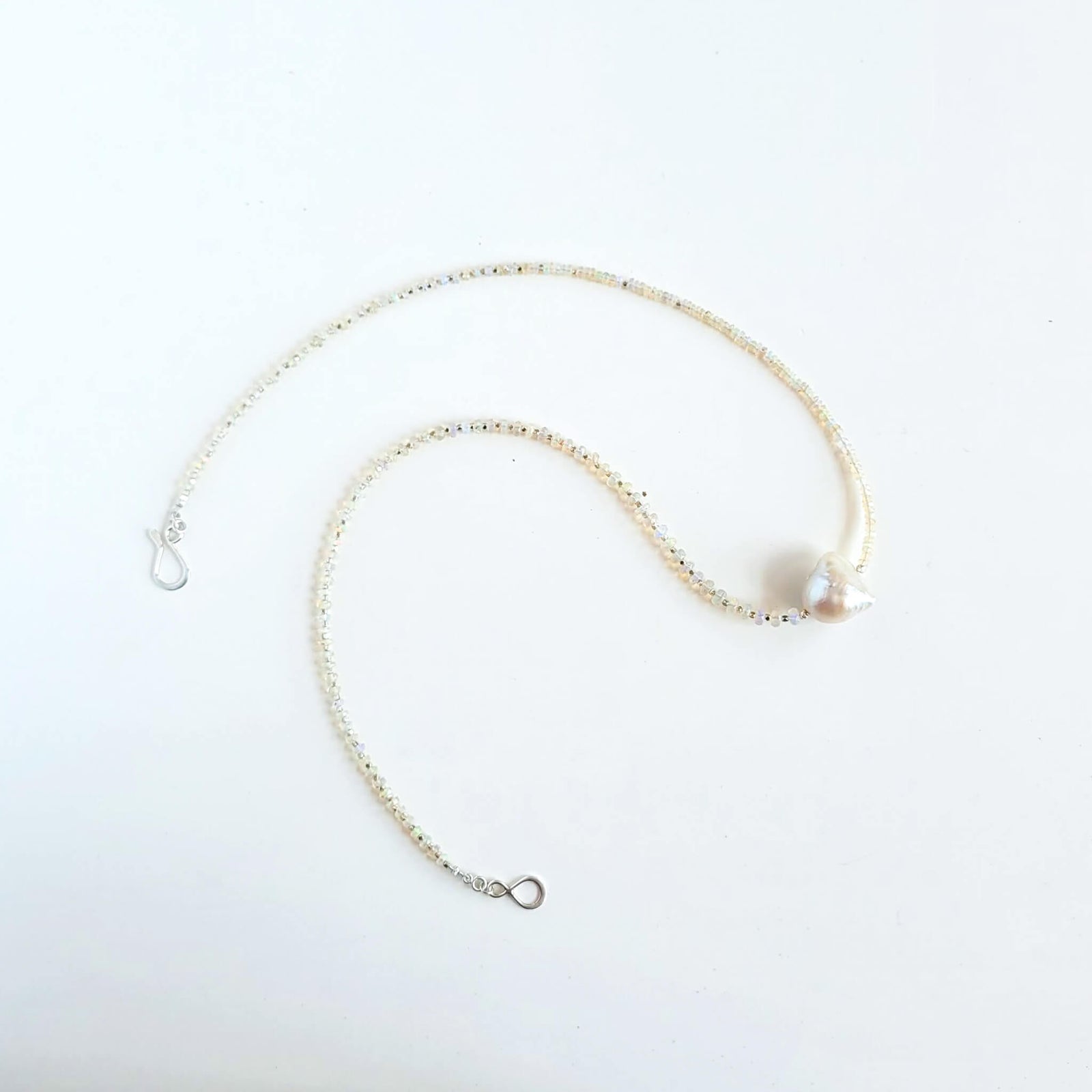 Iridescent Opal and Silver Necklace with a Baroque Pearl Center