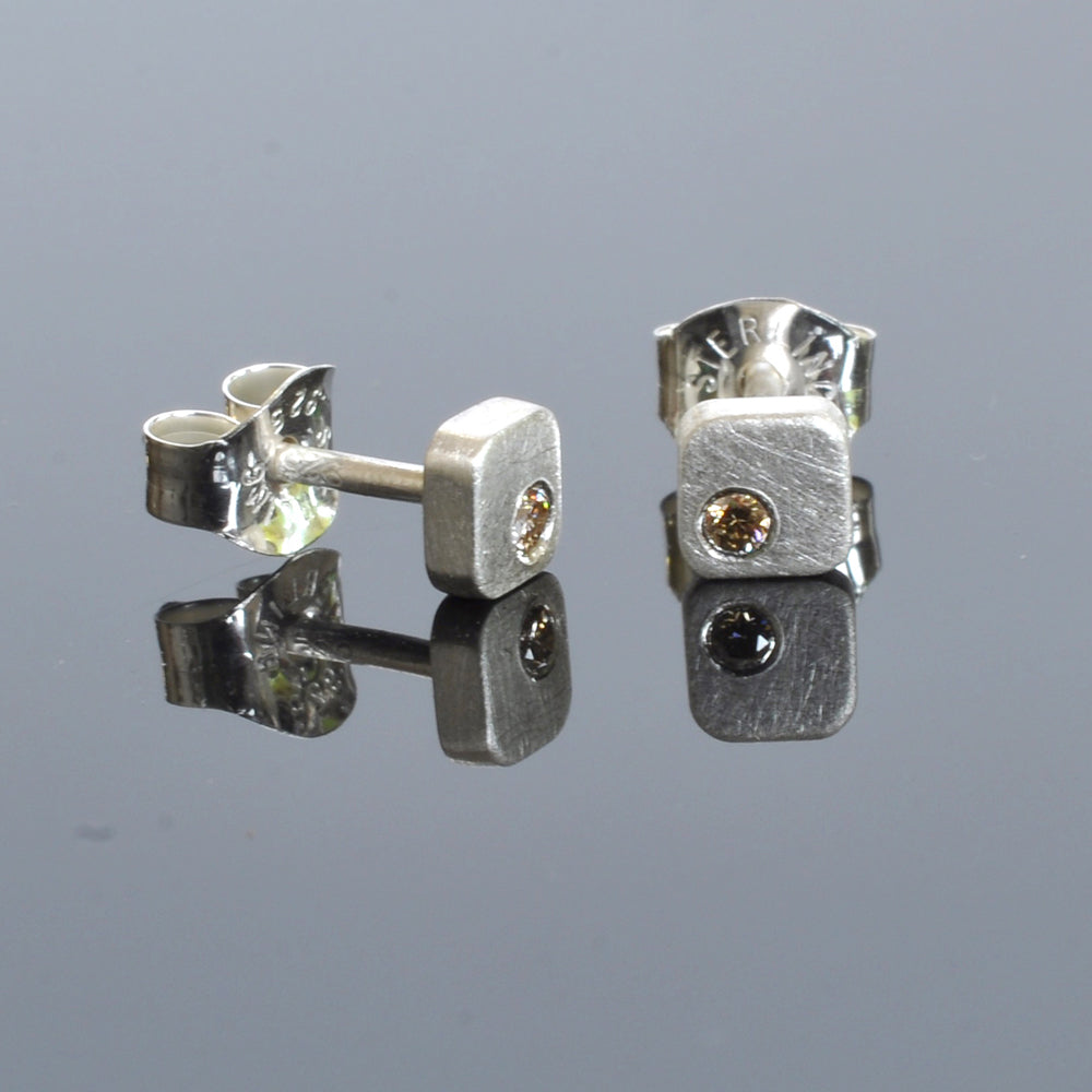 Handmade sterling silver and champagne diamond studs. Made by EC Design in Minneapolis, MN using recycled metal and conflict-free stones.