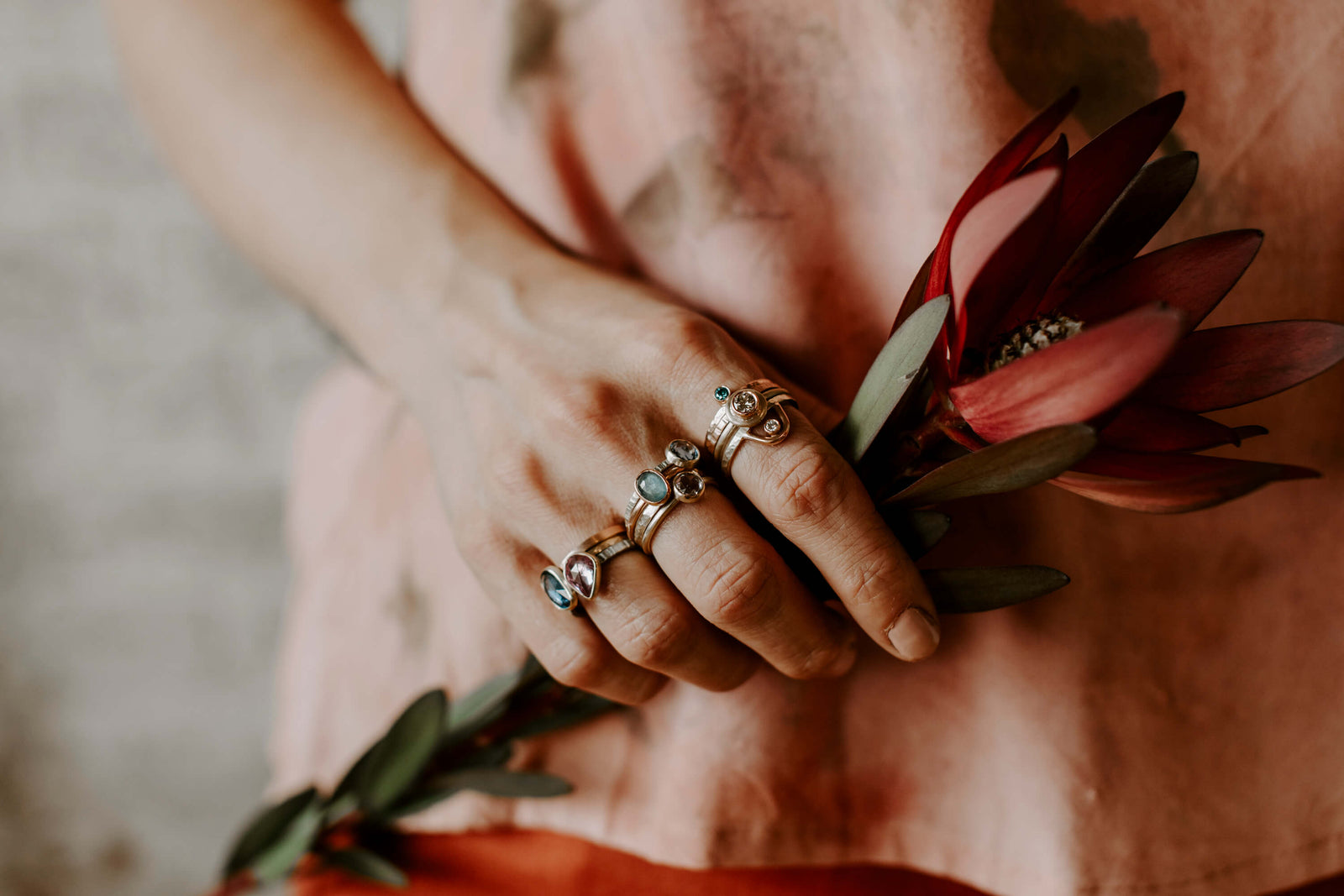 Handmade diamond and sapphire rings from EC Design in Minneapolis, MN. Each ring is ethically made using recycled metal and conflict-free stones.
