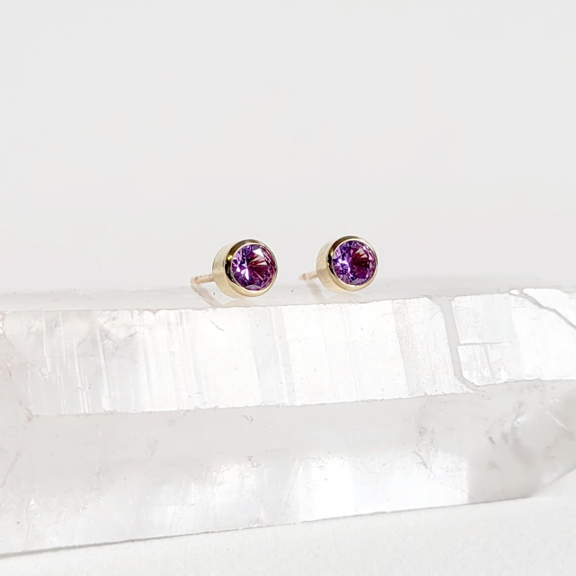 Purple-Pink Sapphire Stud Earrings in Yellow Gold