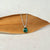 Pendant necklace with rose cut emerald bezel set in yellow gold. Handmade by EC Design Jewelry in Minneapolis, MN.