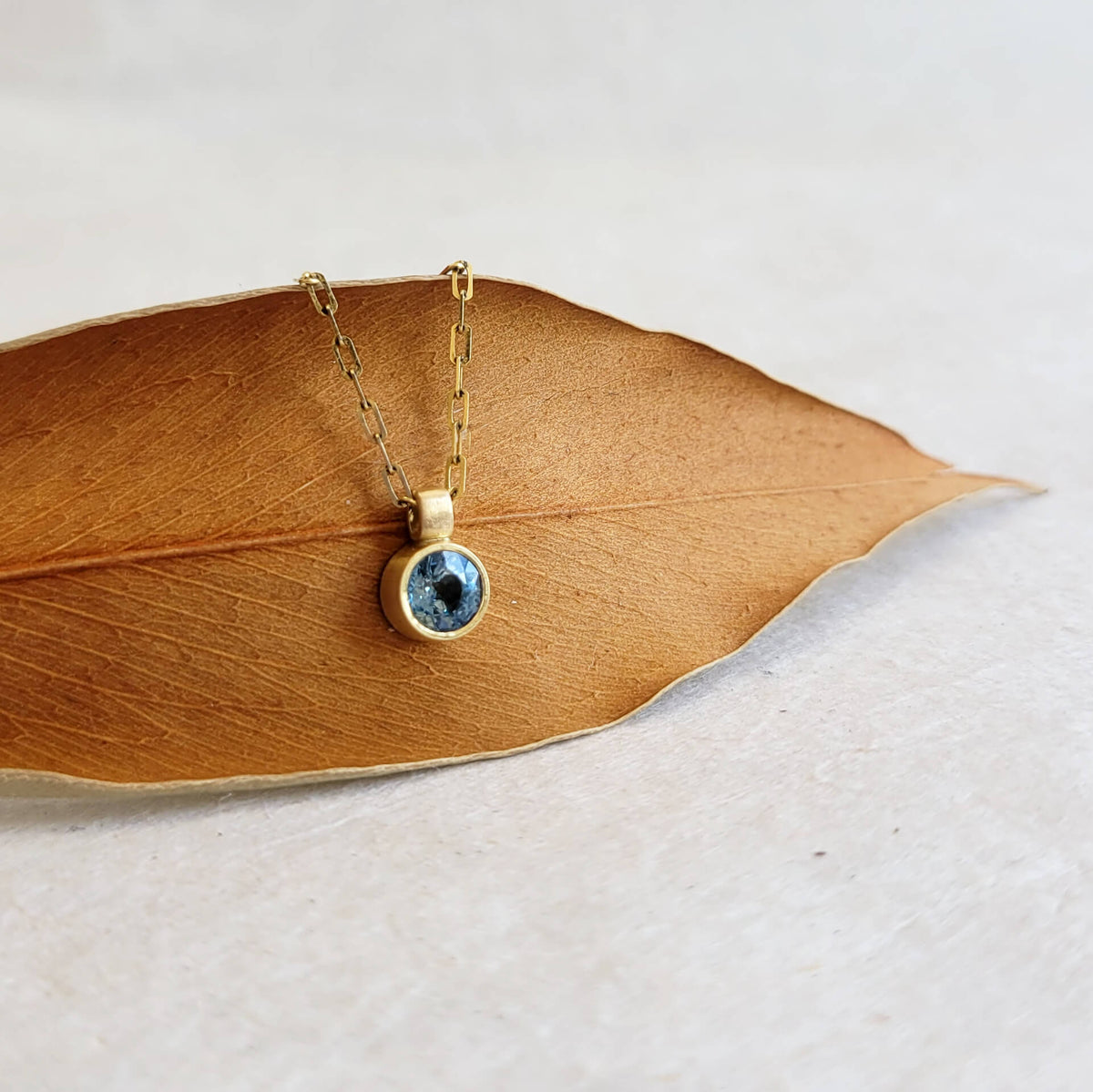 Ocean Blue Sapphire Pendant on Yellow Gold Chain