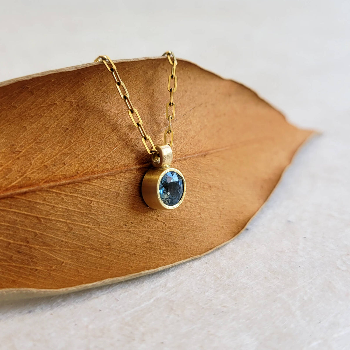 Ocean Blue Sapphire Pendant on Yellow Gold Chain