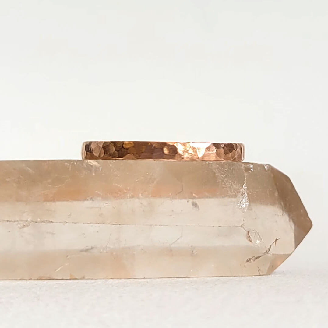 Hammered stacking band in rose gold. Handmade by EC Design Jewelry in Minneapolis, MN using recycled metal.