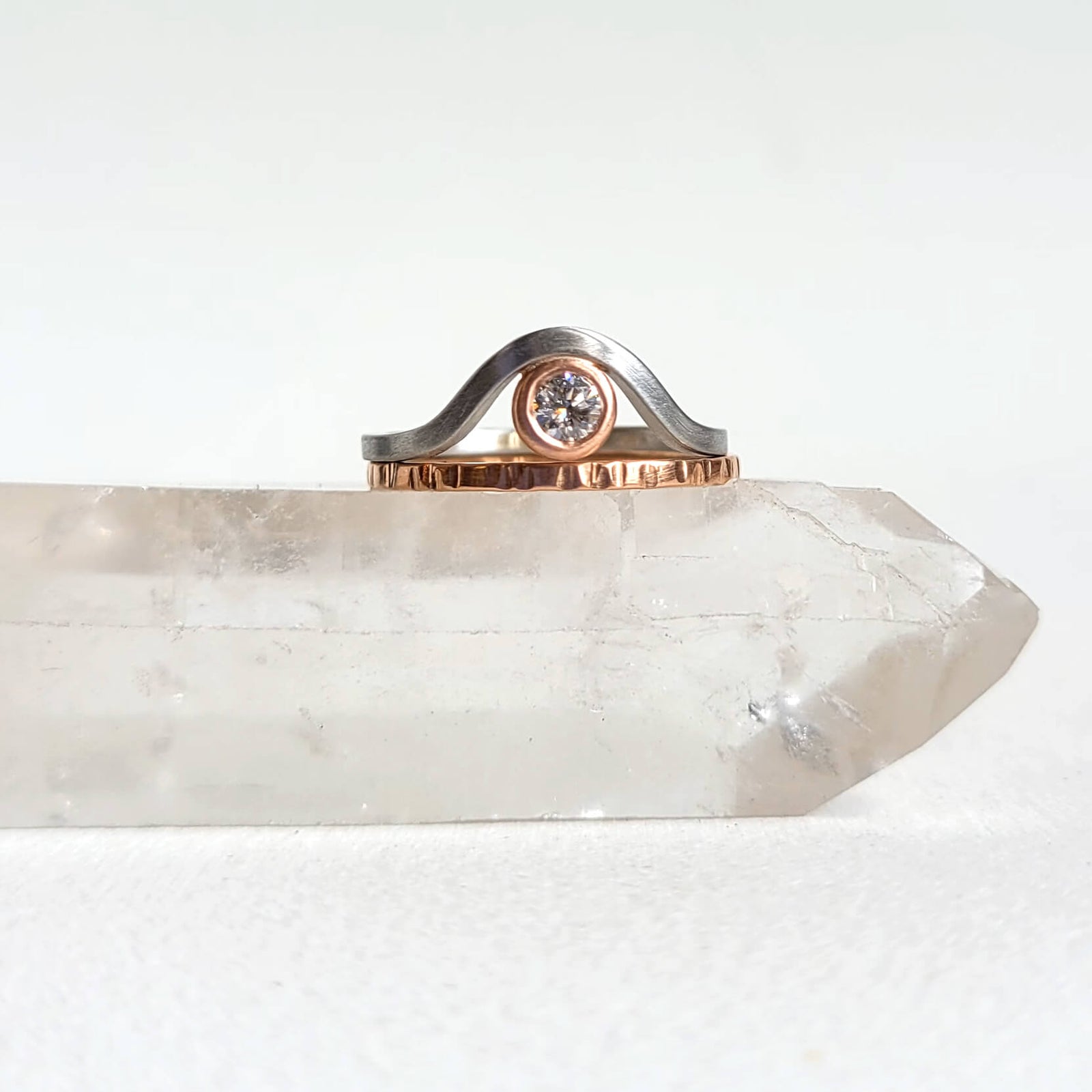 Contour Band in Platinum with Rose Gold and a Diamond