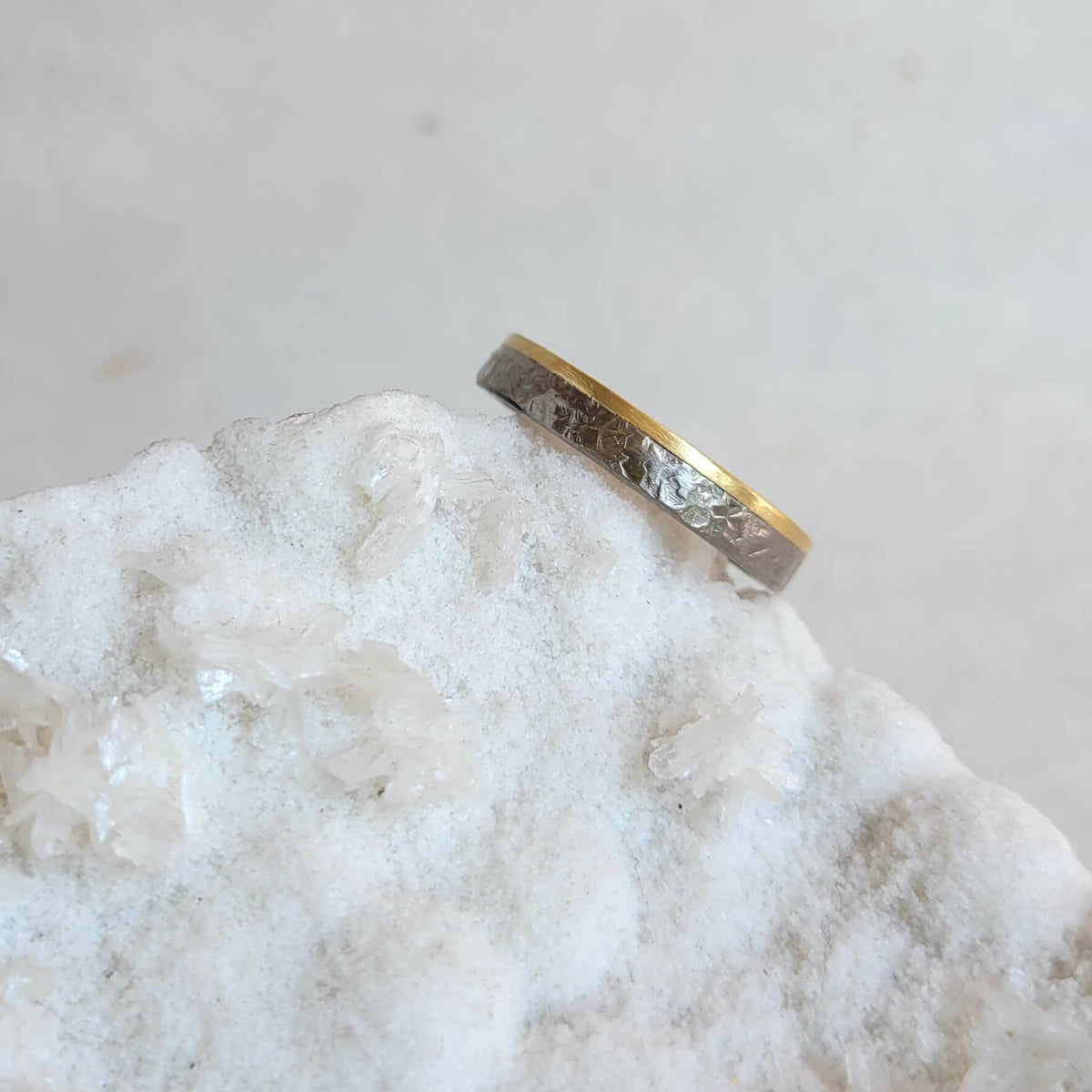 Palladium and yellow gold wedding band handmade by EC Design Jewelry in Minneapolis, MN.