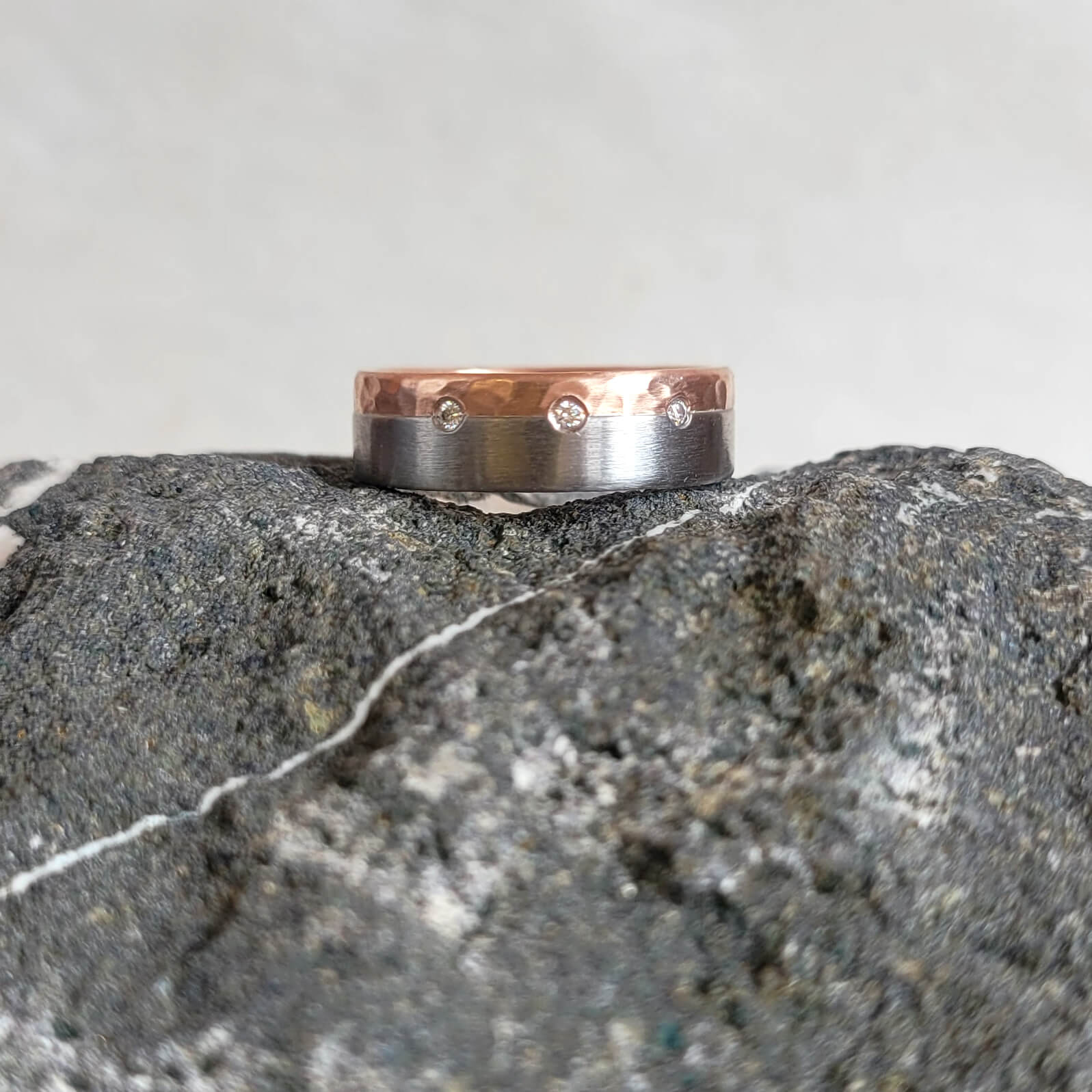 Rose gold and palladium diamond band from EC Design Jewelry in Minneapolis, MN.