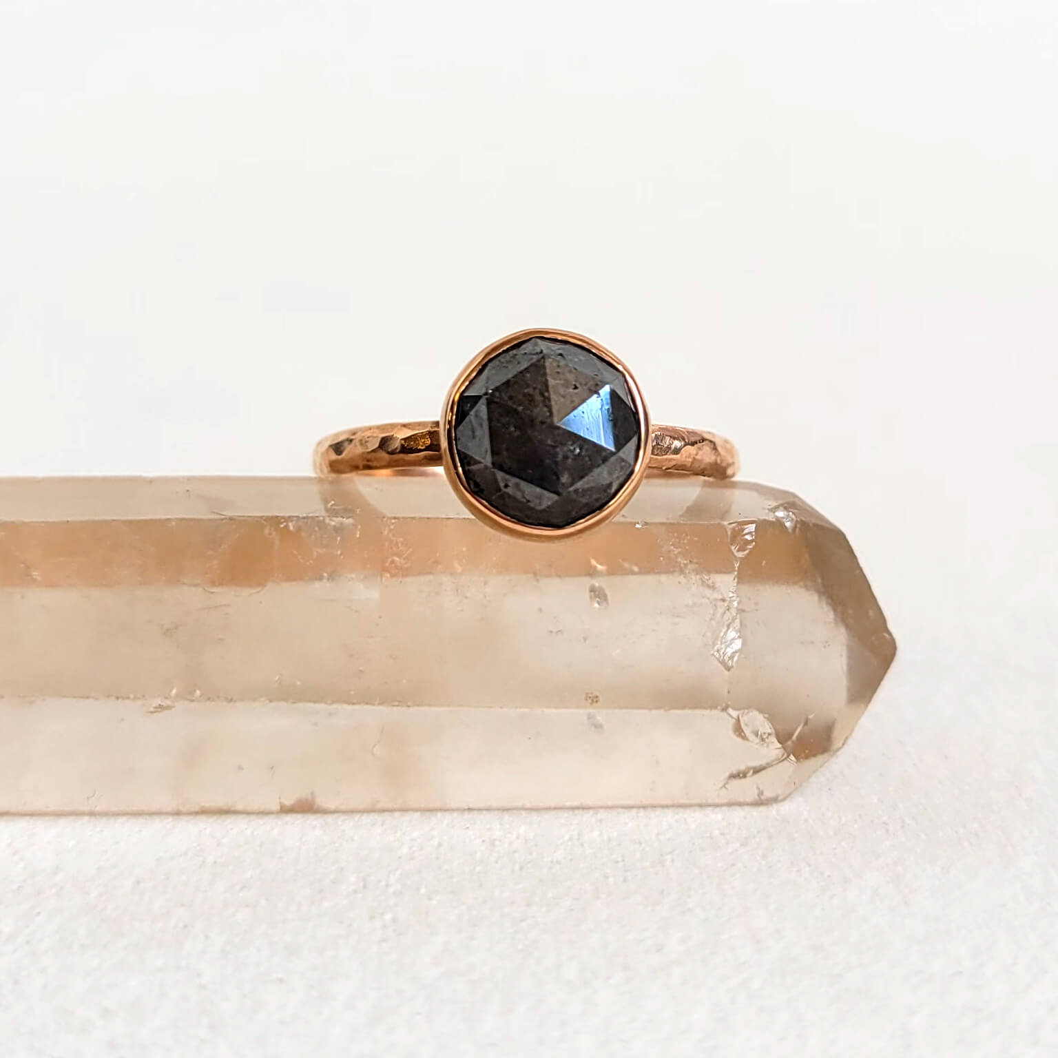Handmade modern engagement ring. Gray rose cut diamond in red gold. Handmade by EC Design Jewelry in Minneapolis, MN.