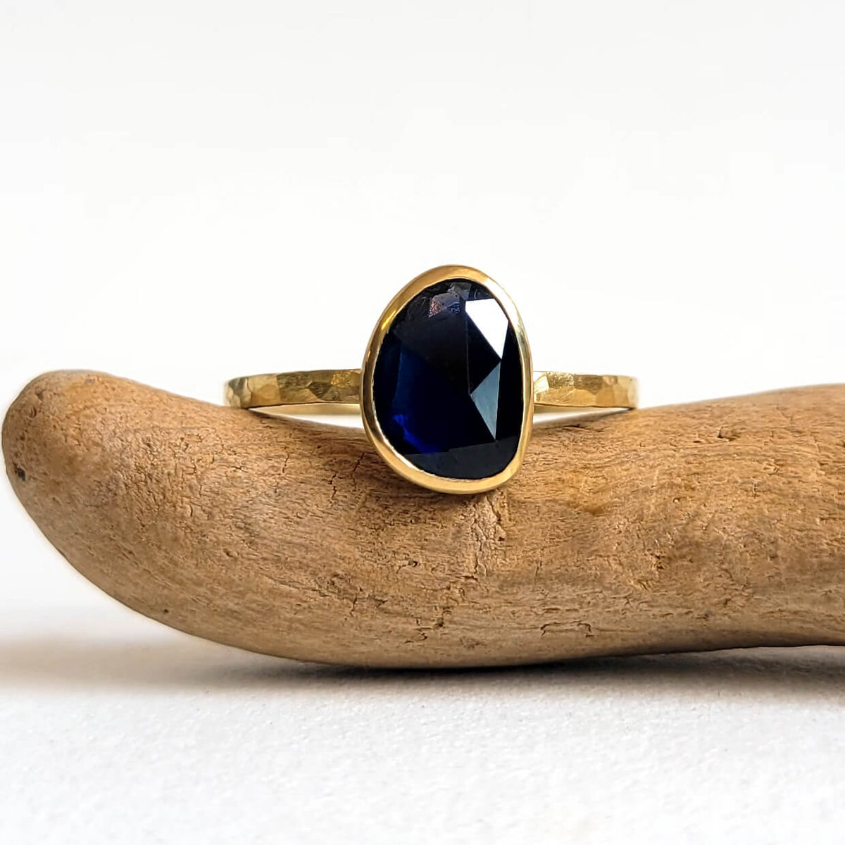 Deep Blue Organic Sapphire Ring in Hammered Gold