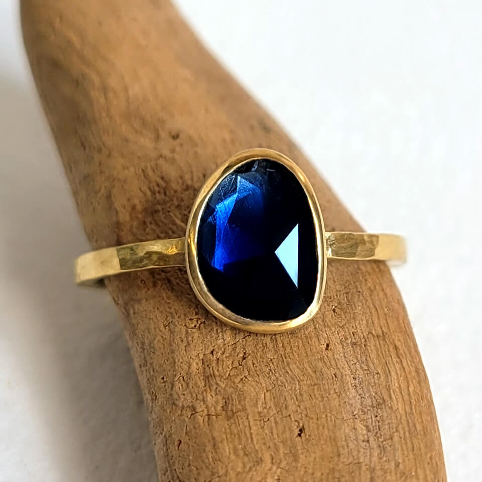 Deep Blue Organic Sapphire Ring in Hammered Gold