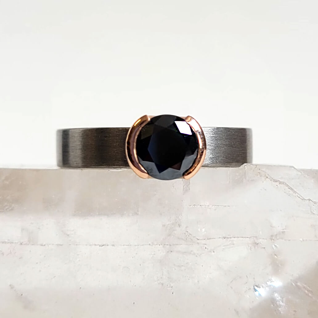 Round Brilliant Black Moissanite Ring in a Half Bezel