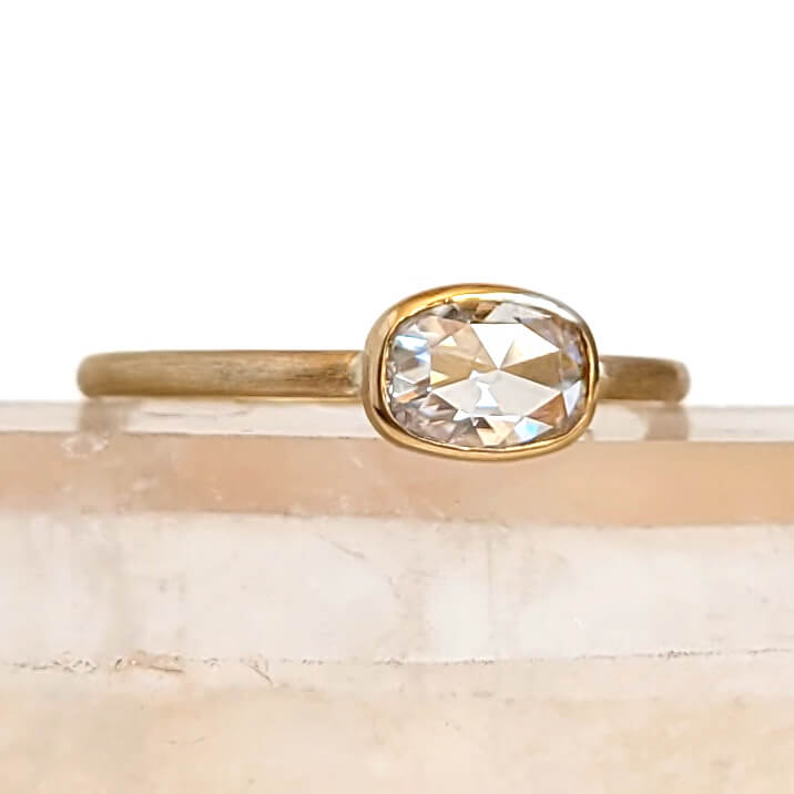 Horizontal Oval Cushion Cut Moissanite Ring in Hammered Yellow Gold