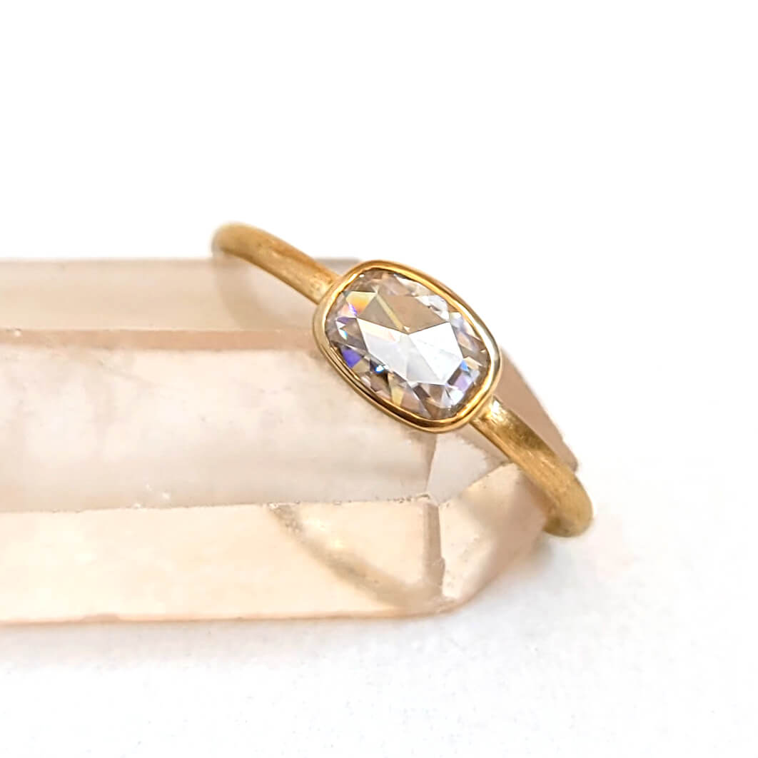 Horizontal Oval Cushion Cut Moissanite Ring in Hammered Yellow Gold