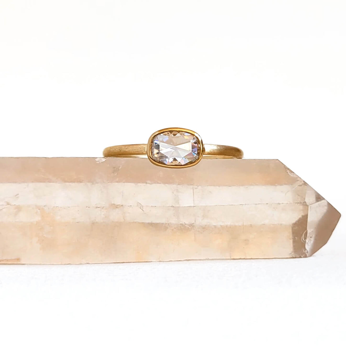 Horizontal Oval Cushion Cut Moissanite Ring in Hammered Yellow Gold