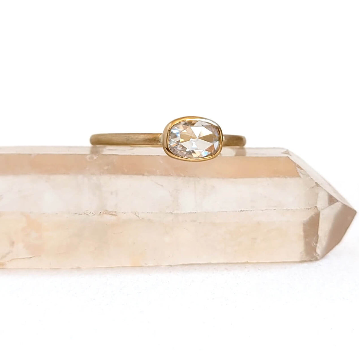 Horizontal Oval Cushion Cut Moissanite Ring in Hammered Yellow Gold