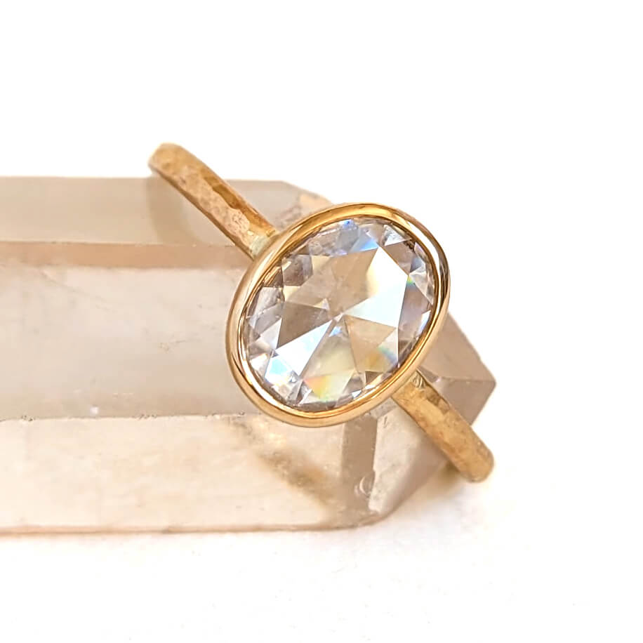 Oval Cushion Cut Moissanite Ring in Hammered Yellow Gold