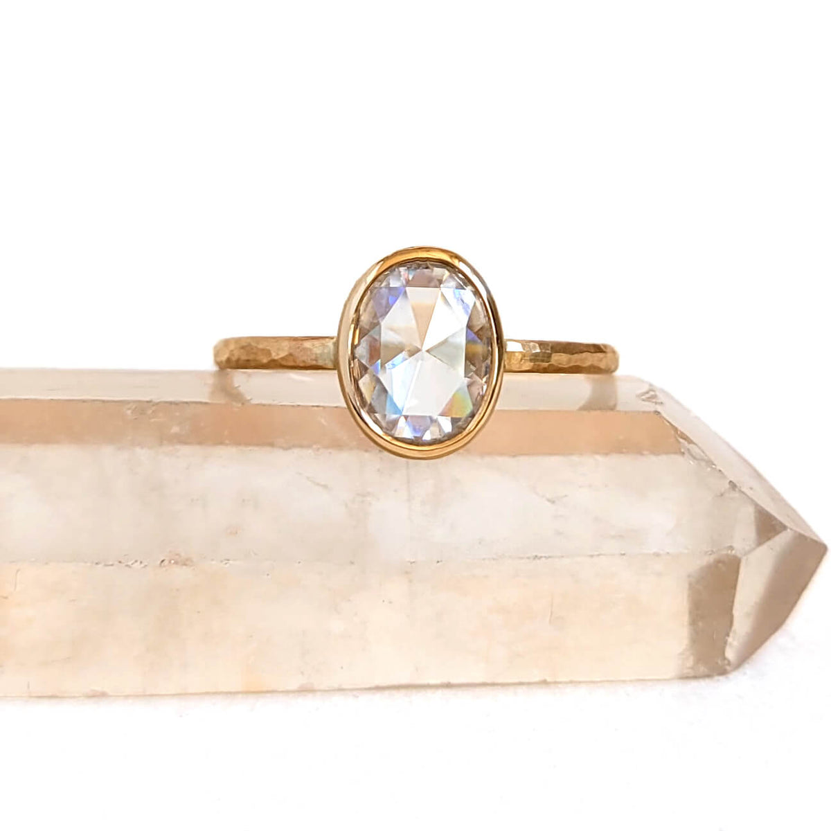 Oval Cushion Cut Moissanite Ring in Hammered Yellow Gold