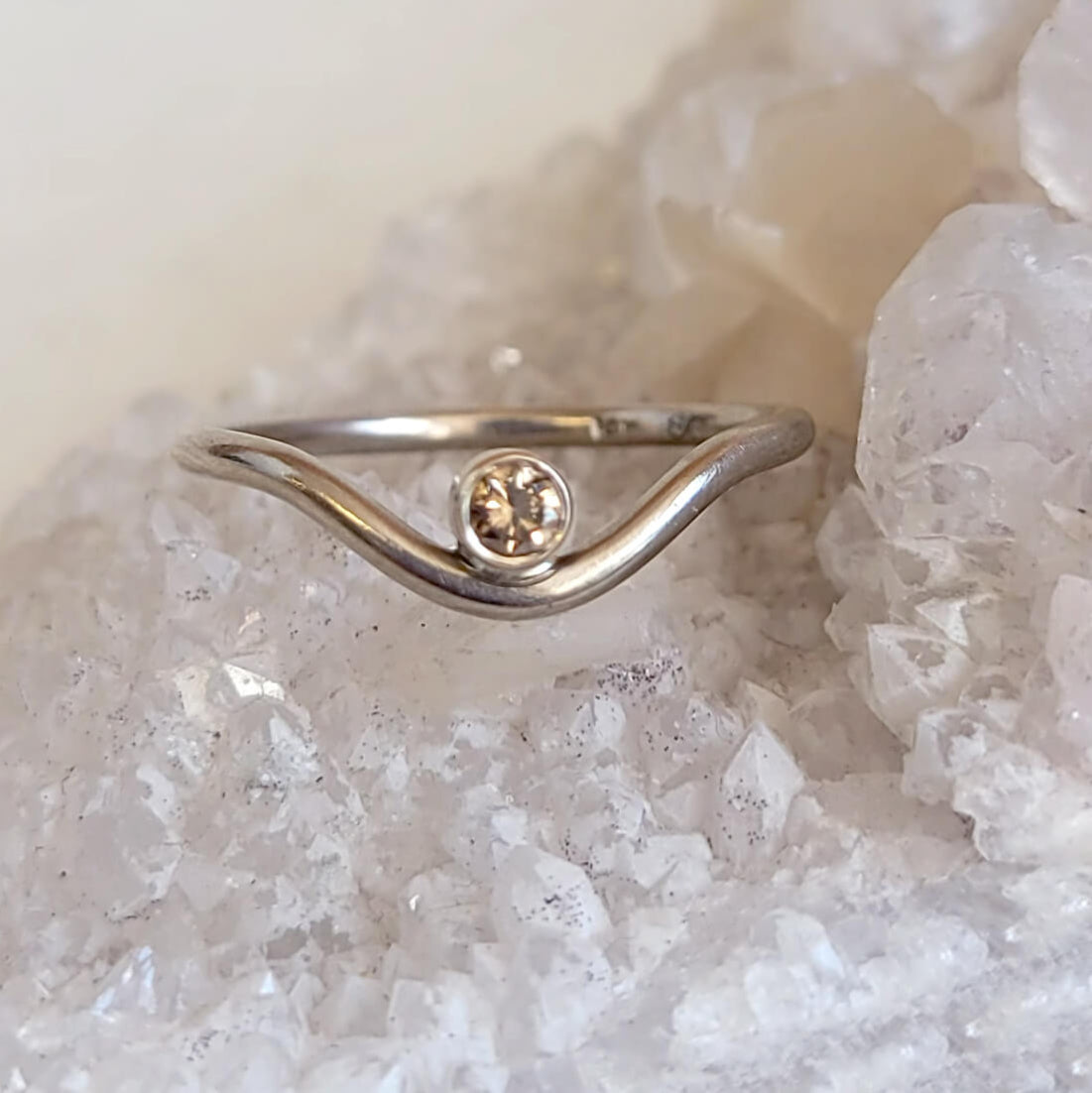 Contoured Gold Band in Palladium White Gold with a Champagne Diamond