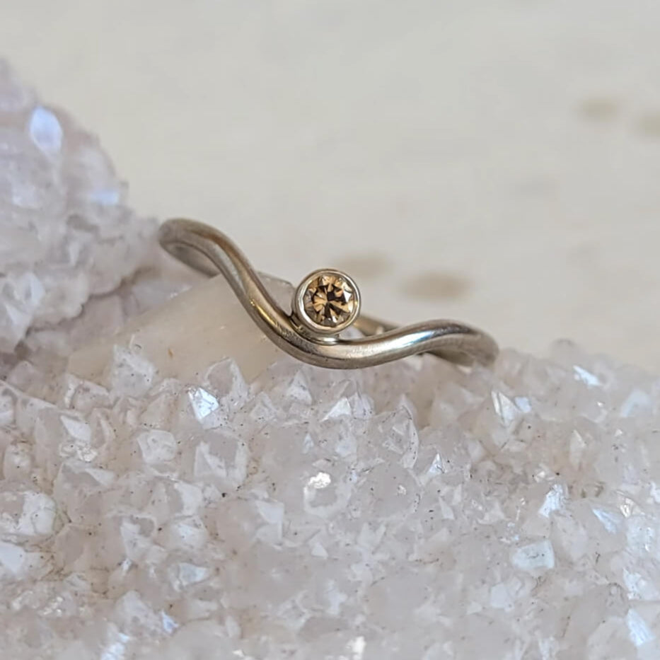 Contoured Gold Band in Palladium White Gold with a Champagne Diamond