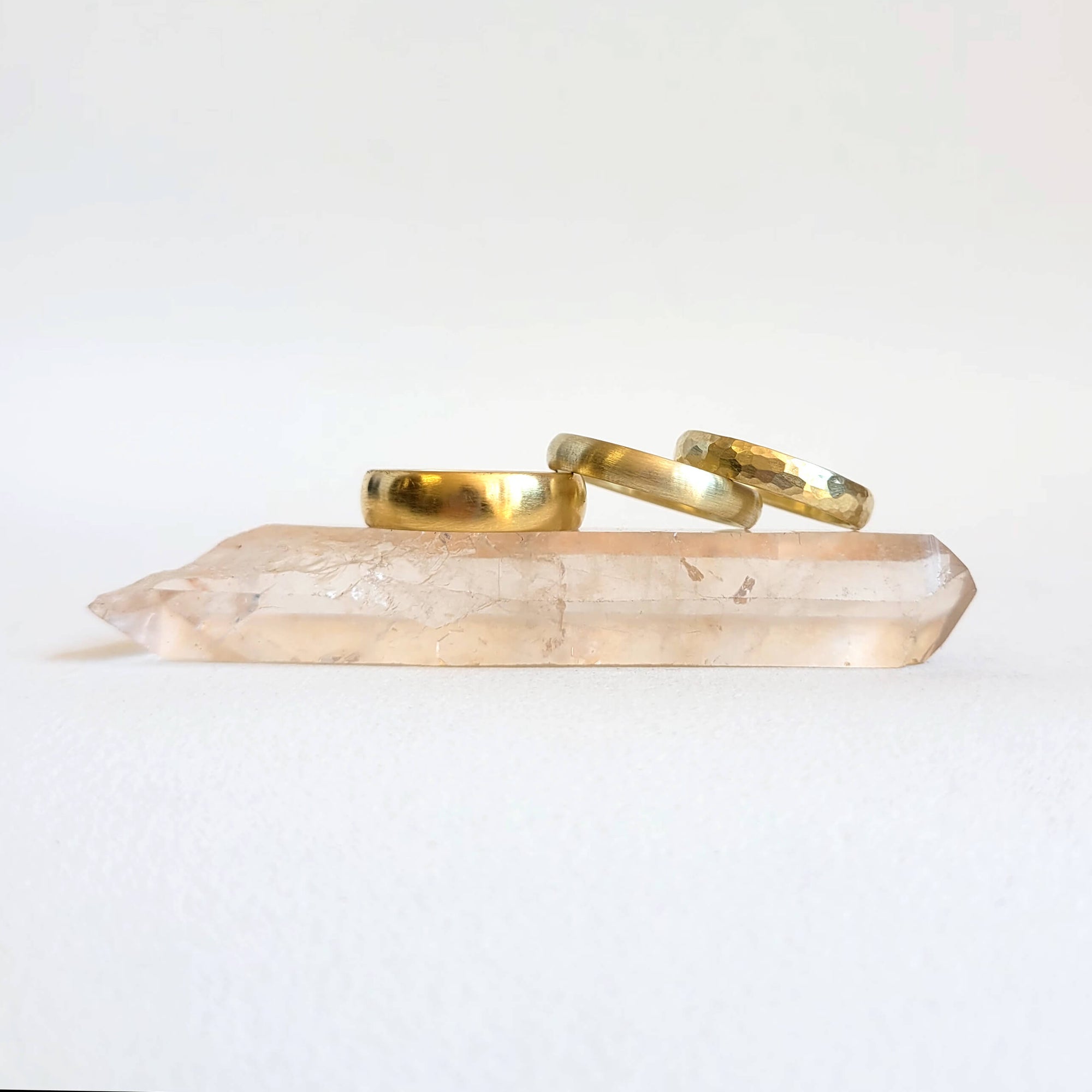 Yellow gold low dome wedding band. Handmade by EC Design Jewelry in Minneapolis, MN using recycled metal.
