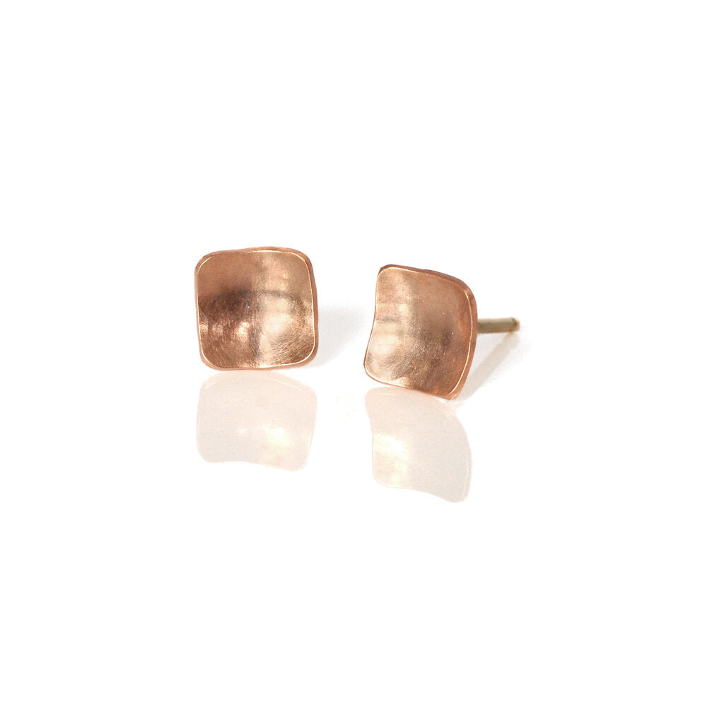 Soft hammered cell studs in 14k red gold. Handmade with recycled metal. From EC Design Jewelry in Minneapolis, MN.
