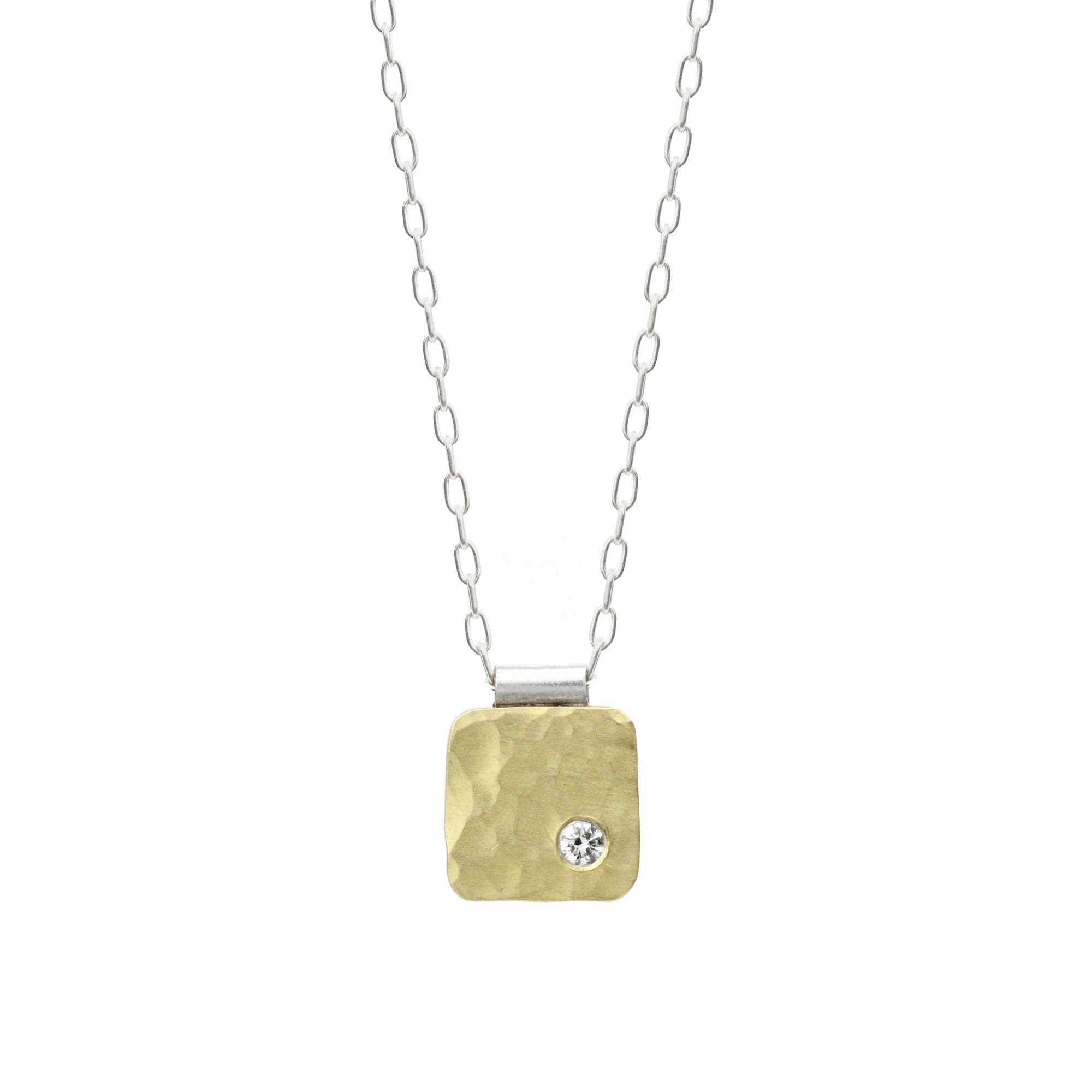 8mm cell pendant in hammered yellow gold with white diamond accent. Handmade by EC Design Jewelry in Minneapolis, MN using recycled metal and conflict-free stone.