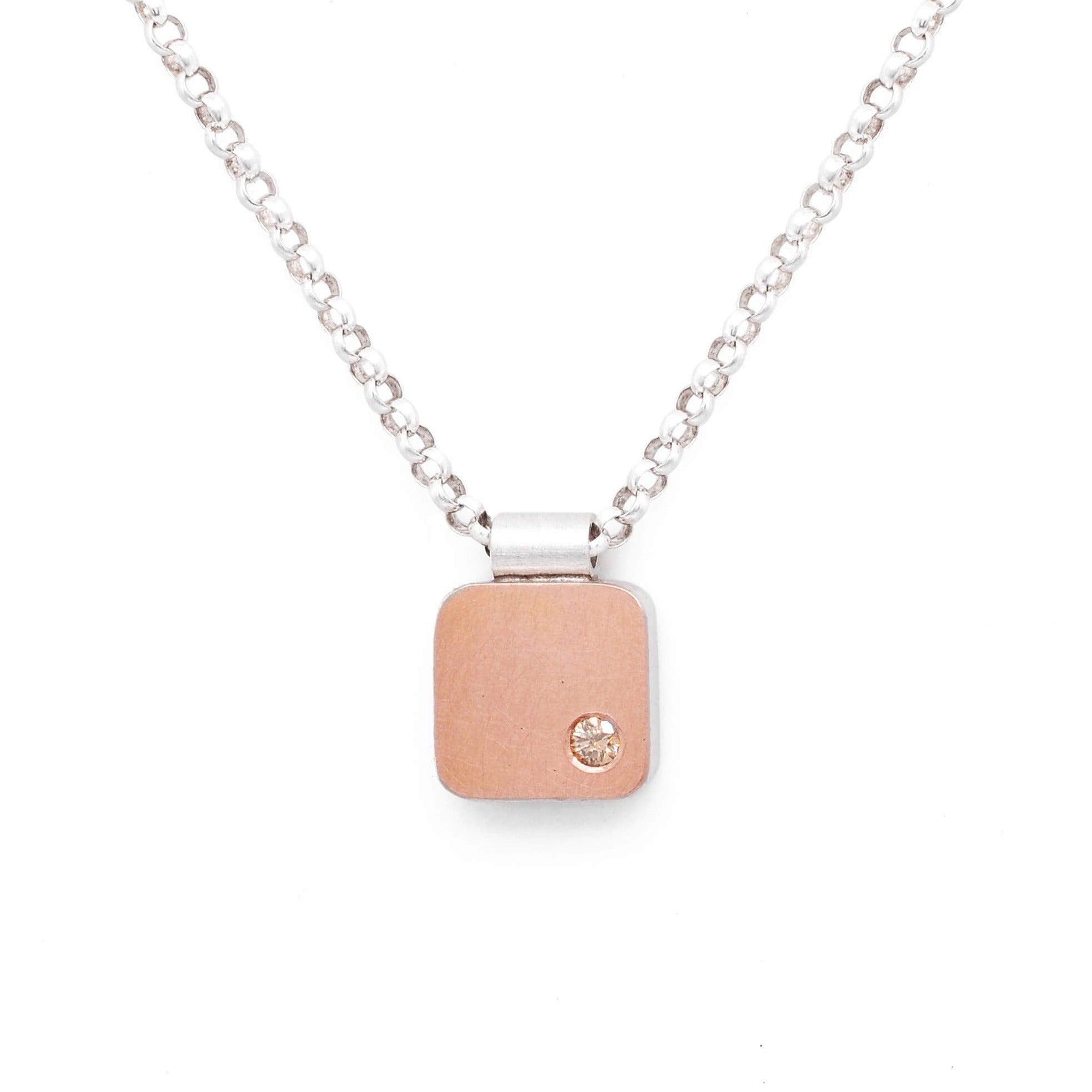 Rose gold cell pendant with champagne diamond. Handmade by EC Design Jewelry in Minneapolis, MN using recycled metal and conflict-free stone.