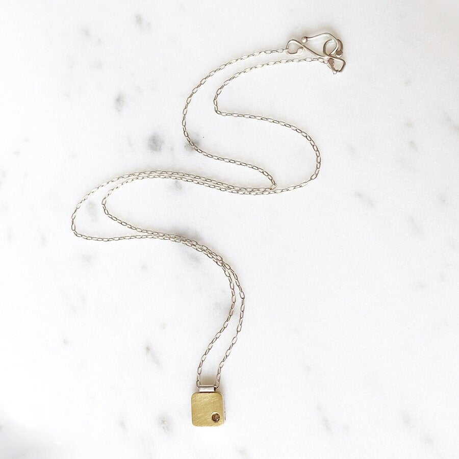18k yellow gold cell pendant with champagne diamond. Handmade by EC Design in Minneapolis, MN using recycled metal and conflict-free stone.