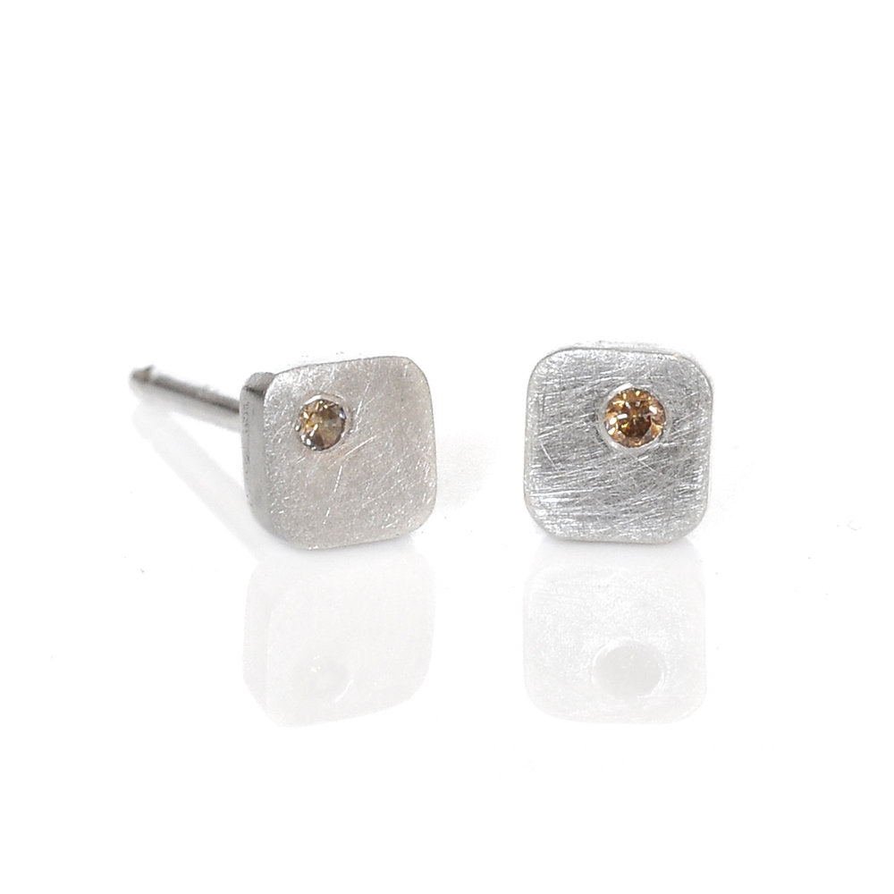 Handmade sterling silver and champagne diamond studs. Made by EC Design in Minneapolis, MN using recycled metal and conflict-free stones.