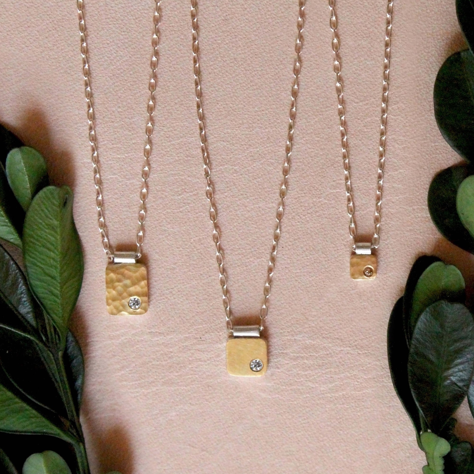 Hammered yellow gold and white diamond rectangle cell pendant. Handmade by EC Design Jewelry using recycled metal and conflict-free stone.