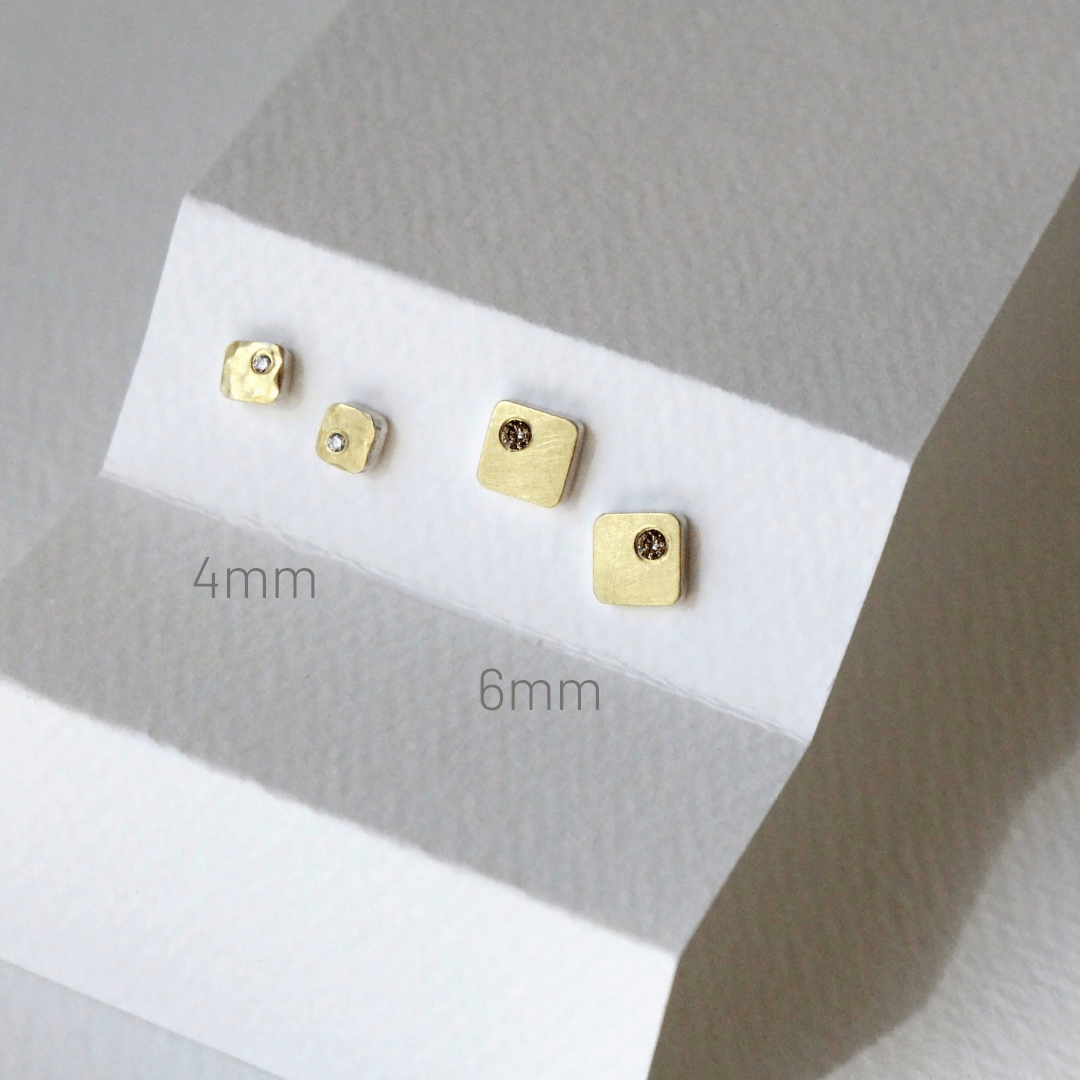 Mixed metal, satin finished, square studs with white diamonds. Available in rose or yellow gold. Handmade by EC Design Jewelry using recycled metal and conflict-free stones.