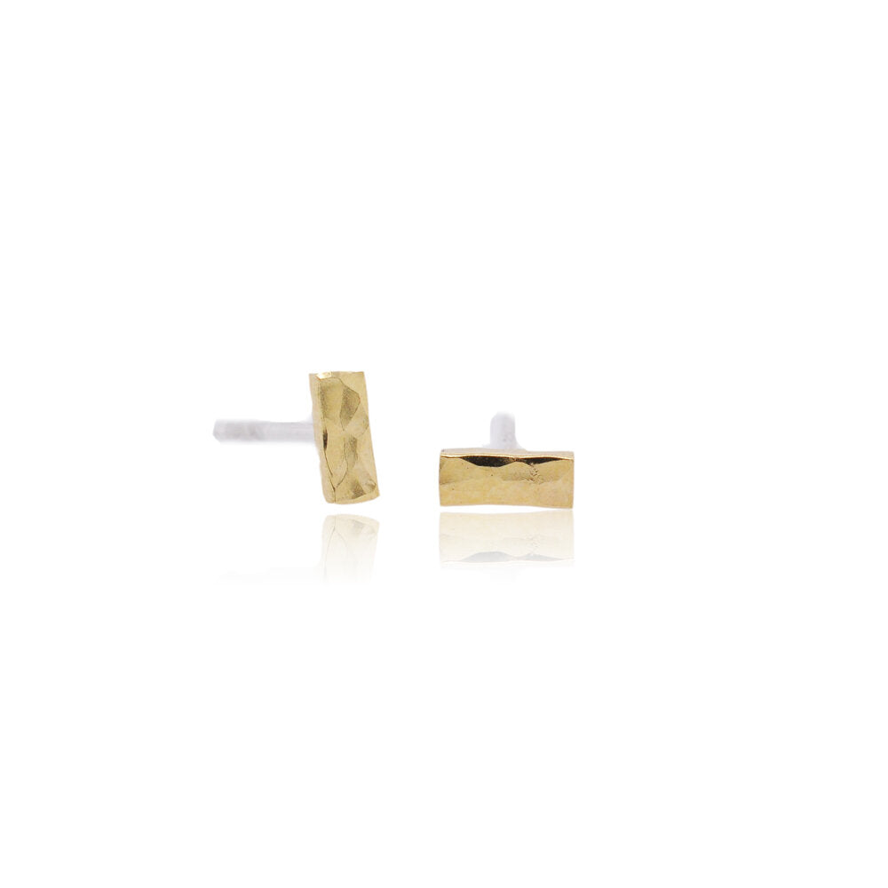 Hammered yellow gold bar studs. Handmade with recycled metal by EC Design Jewelry in Minneapolis, MN.