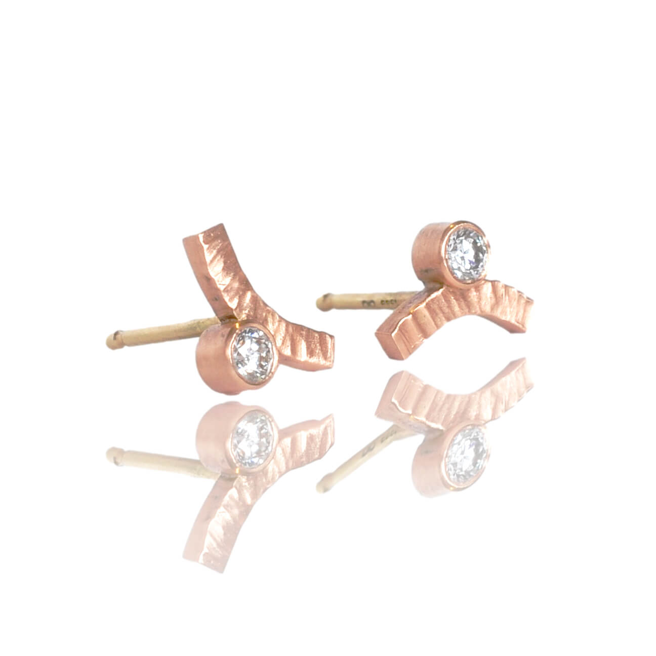 Rose gold diamond earrings with yellow gold posts and backs. Handmade with recycled metal and conflict-free stones.