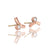 Rose gold diamond earrings with yellow gold posts and backs. Handmade with recycled metal and conflict-free stones.