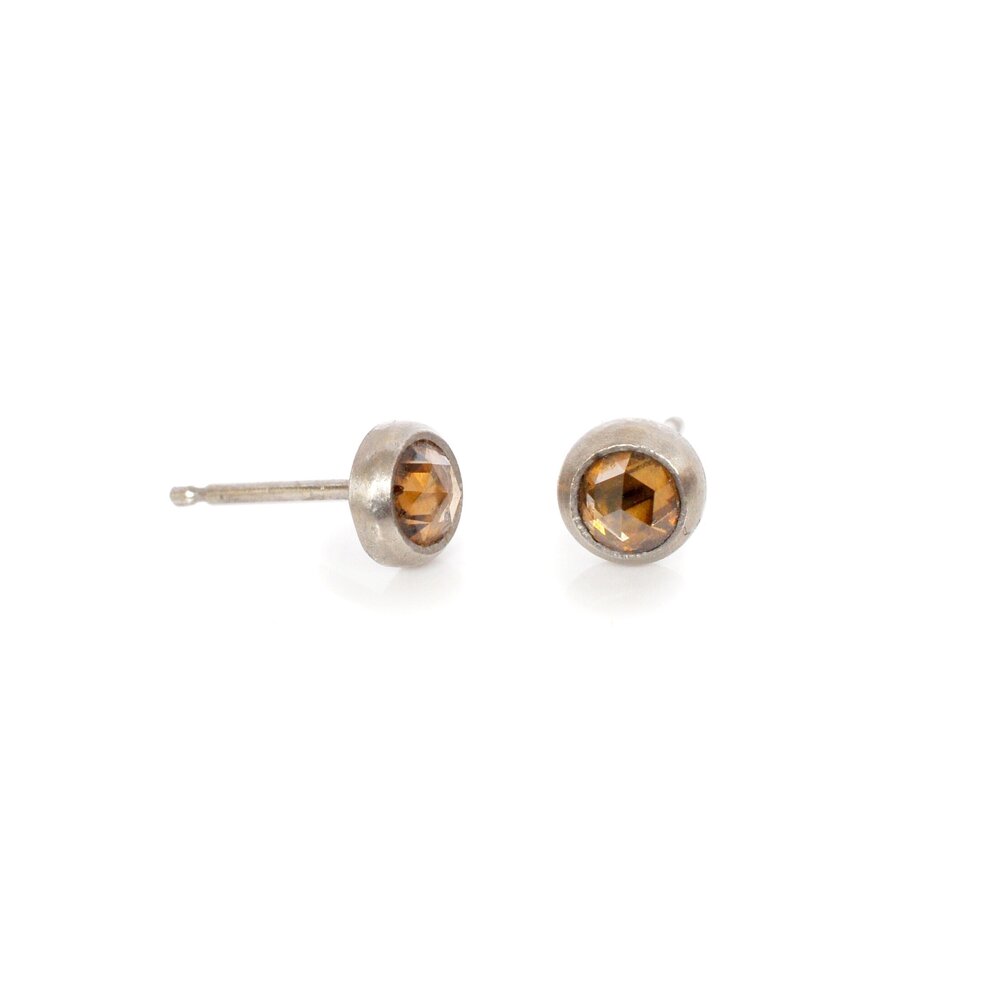 Half carat champagne diamond and palladium stud earrings. Handmade by EC Design Studio in Minneapolis, MN using recycled metal and conflict-free stones.